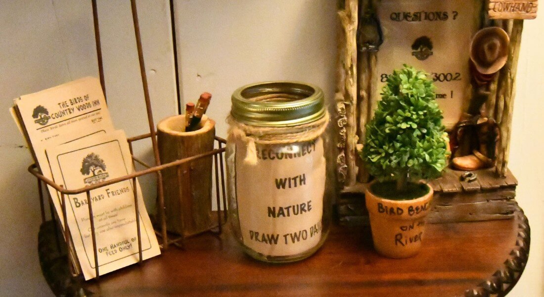 Various items printed on brown paper on a wooden table. 